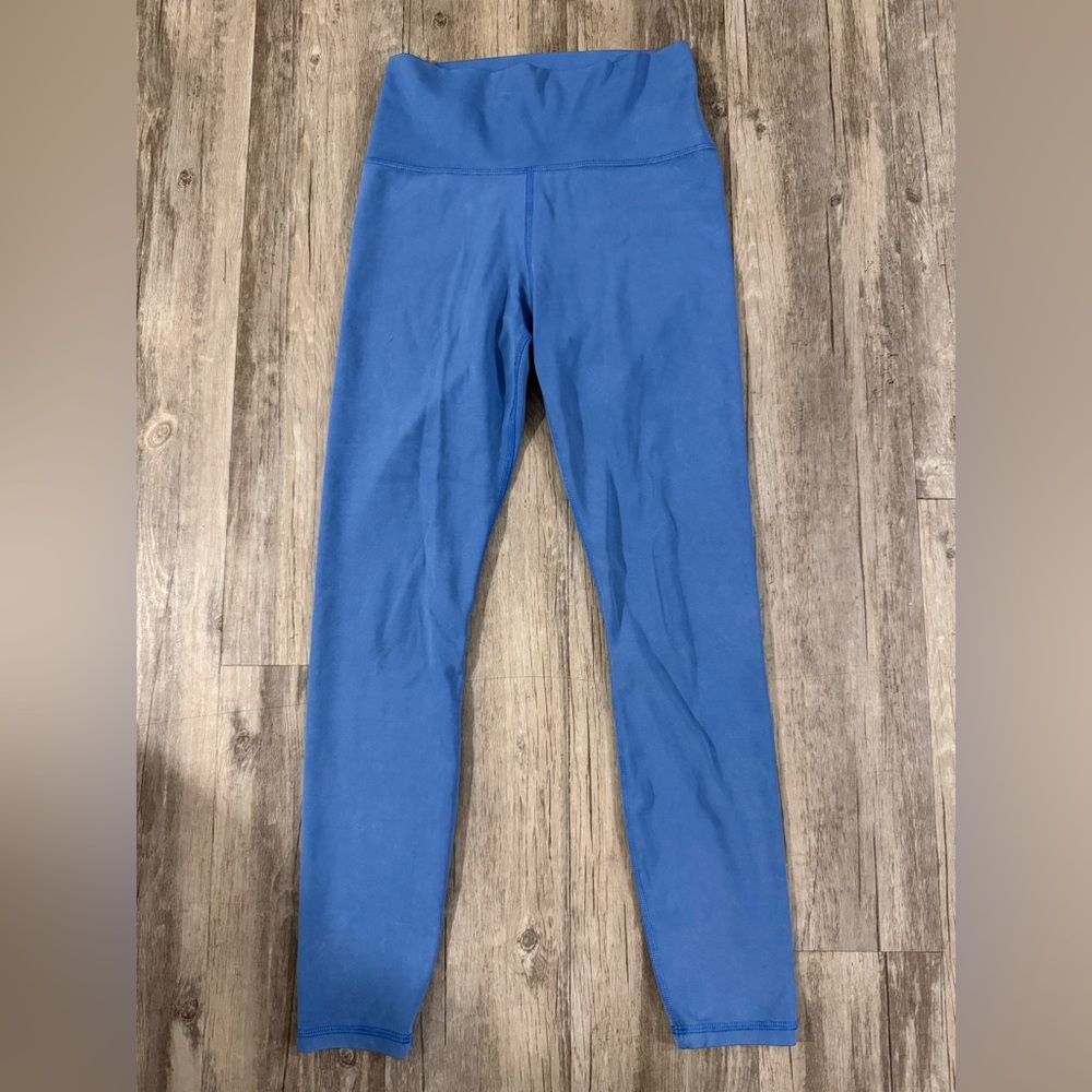 Vuori acid wash style blue leggings. Size small